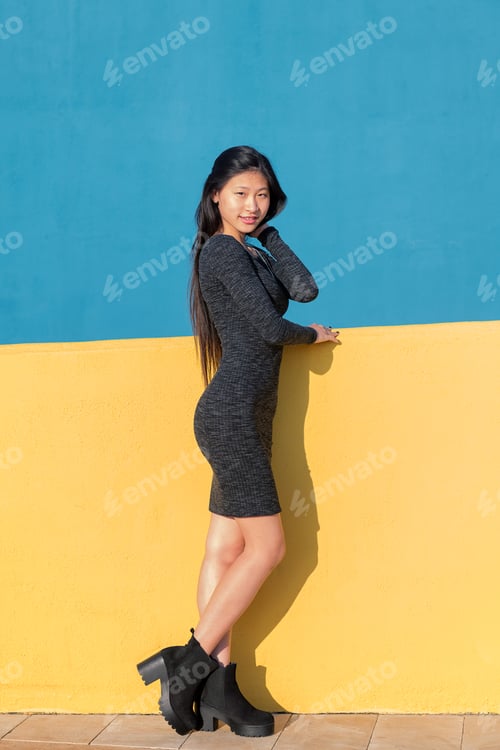 Preview: asian woman posing on colorful background