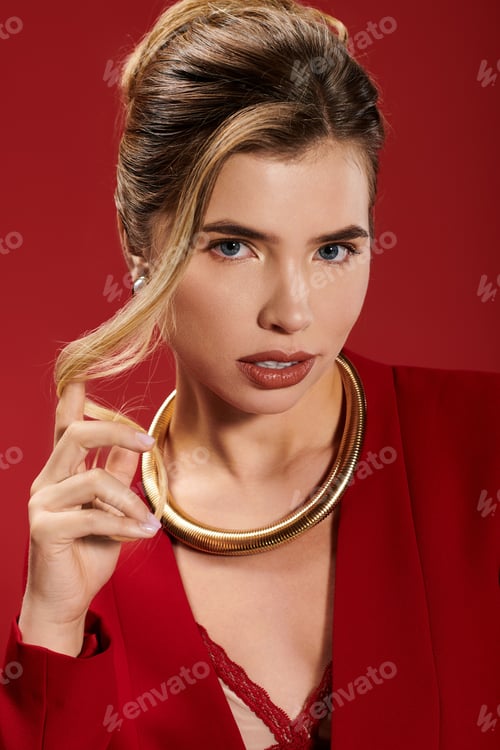 Preview: Woman Posing in Red Jacket and Gold Necklace