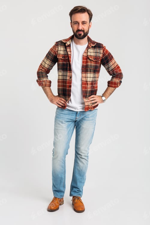 Preview: handsome bearded man in hipster outfit dressed in jeans and checkered shirt