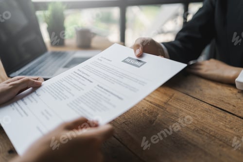 Preview: New graduate woman filling out an application form for HR department Review