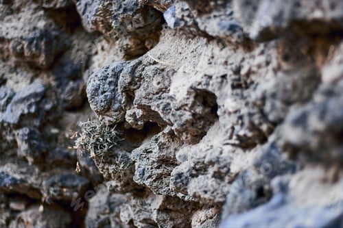 Preview: Closeup shot of a wall made of small stones
