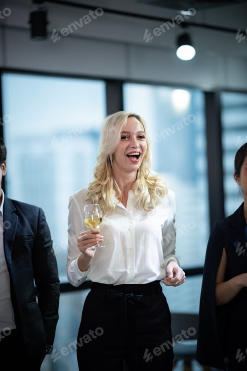 Preview: Business partners toast champagne company event celebration success