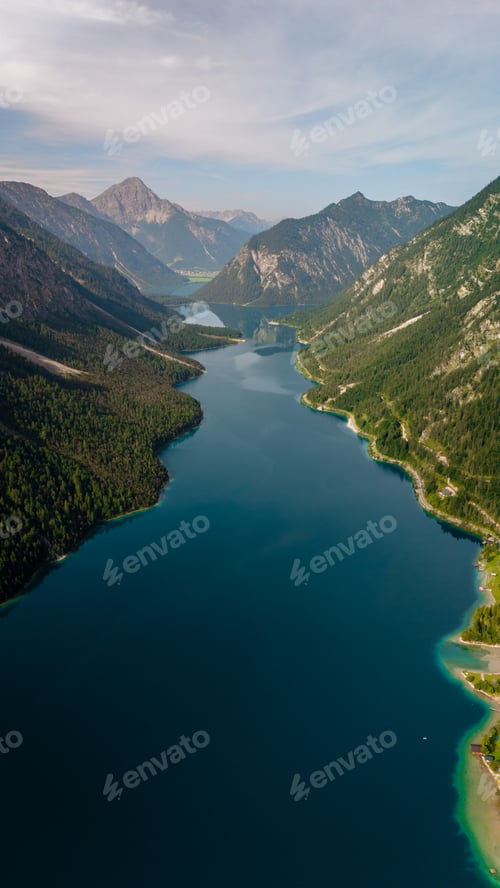 Preview: Discovering the serene beauty of Plansee in the Austrian Alps during a tranquil summer day