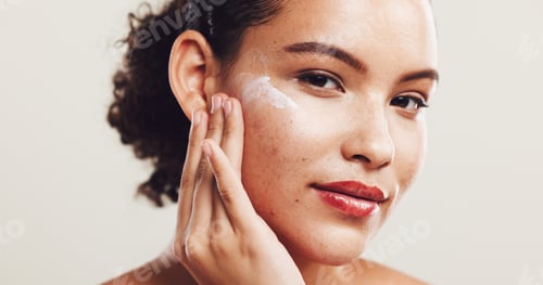 Preview: Portrait, cream and woman with dermatology, cosmetics and shine on white studio background. Face, p