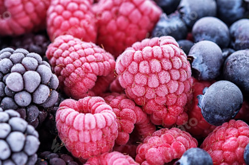 Preview: The frozen berries of raspberries, blackberries, blueberries, covered with hoarfrost.