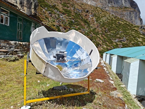 Preview: Warming the teapot in a solar cooker. Nepal. Himalaya