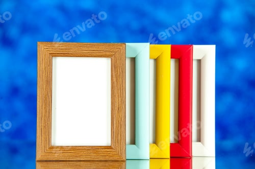 Preview: front view different picture frames with colored corners on a blue background family memory glass