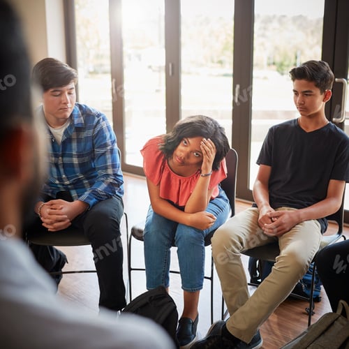 Preview: Unhappy Female Pupil In High School Discussion Group