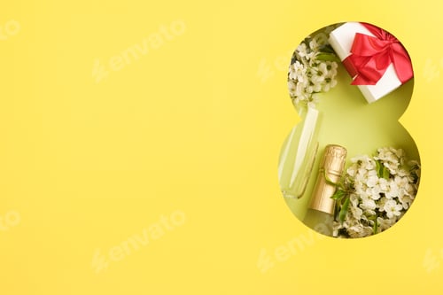 Preview: 8 March greeting card. Paper cut Eight made of yellow background and fresh spring flowers bouquet of