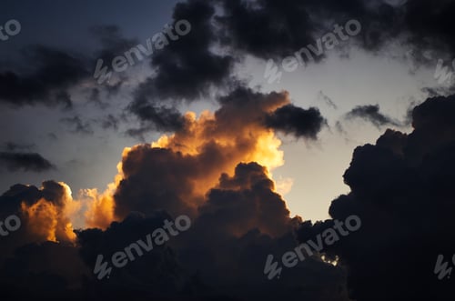 Preview: A dark cloud with a sunset in the clouds