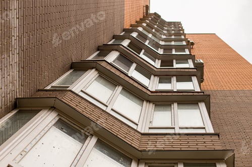 Preview: Low angle shot of the windows of a building