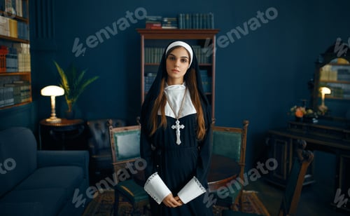 Preview: Young nun in a cassock holds book