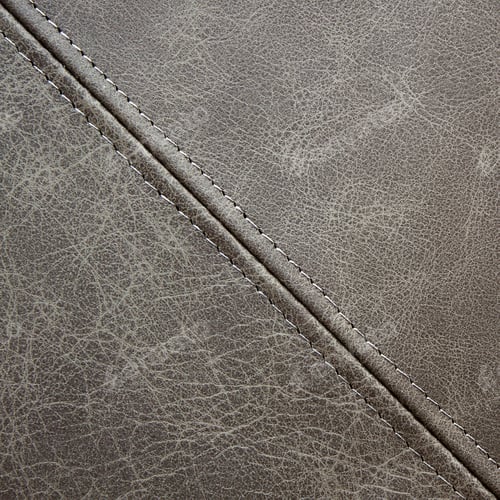 Preview: Texture gray leather with a diagonal decorative seam, closeup background