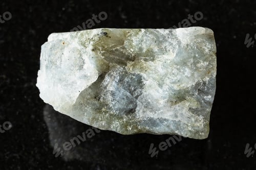 Preview: sample of rough gray labradorite rock on black
