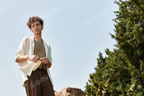 Preview: Stylish summer outing of a young man enjoying the park’s greenery under the sun