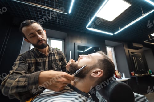 Preview: Man Getting a Beard Trim at Barbershop