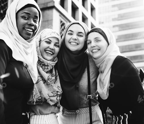 Preview: Group of islamic friends embracing and smiling together