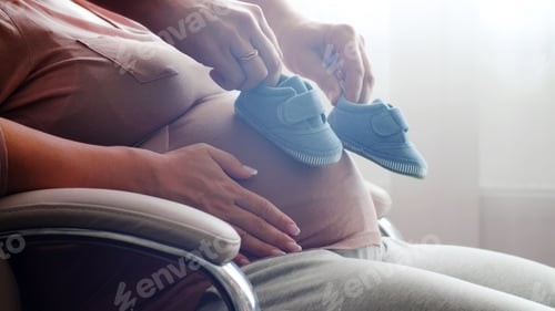Preview: Happy couple, pregnant wife and husband feels love and relax at home.