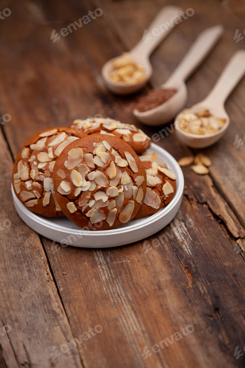 Preview: Almond cookies. Food background. Homemade breakfast cookie. Sweet almonds chips snack.
