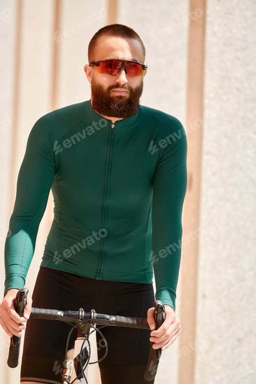 Preview: Cyclist man riding fixed gear sport bike in sunny day on a city
