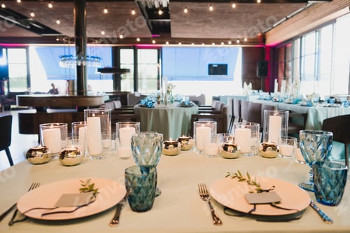 Preview: Coziness and style. Modern event design. Table setting at the wedding reception.