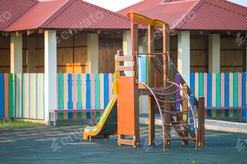 Preview: Nursery playground with colorful slides on soft rubber flooring with no children