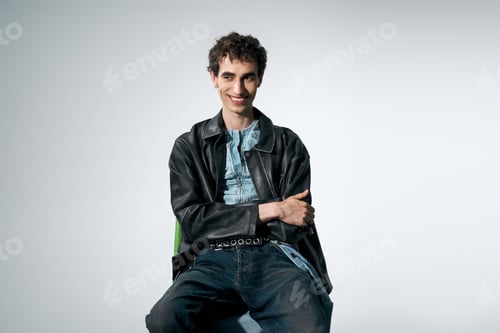 Preview: Striking presence of a stylish man showcasing elegance with confidence in a modern setting