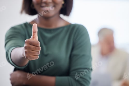 Preview: Shot of an unrecognisable businesswoman showing thumbs up during a meeting in a modern office