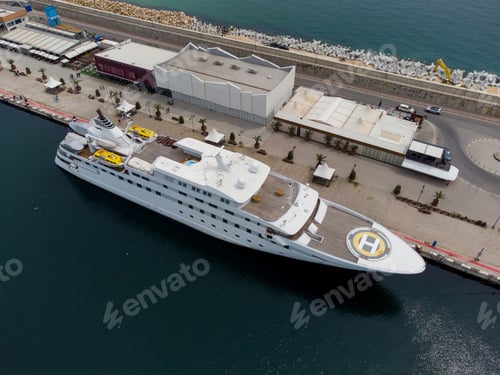 Preview: aerial view of luxury yacht in port