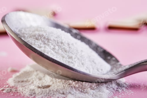 Preview: Collagen powder on a pink background. Extra protein intake.