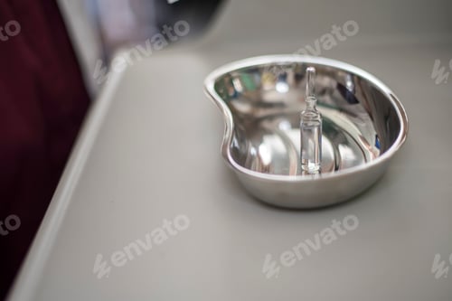 Preview: Doctor prepares a syringe for vaccination