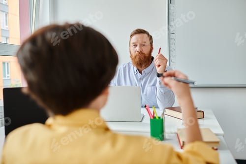 Preview: bearded man at desk