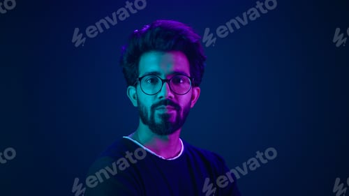 Preview: Portrait Indian serious man developer coding worker programmer profile looking to side turn head