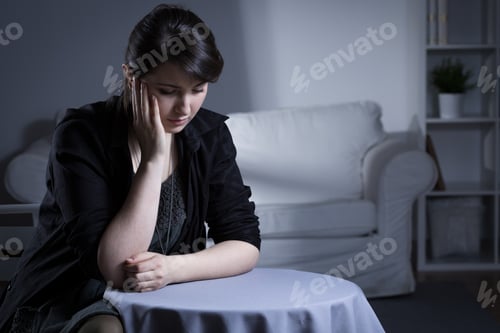 Preview: Portrait Of Despair Widow Being In Mourning