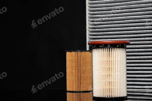Preview: Car engine filter on dark background, close up