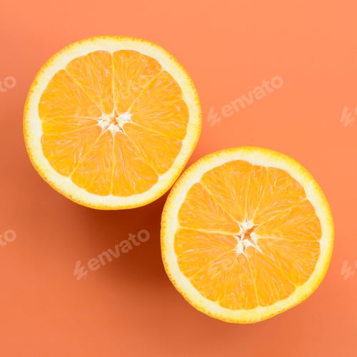 Preview: Top view of a several orange fruit slices on bright background in orange color