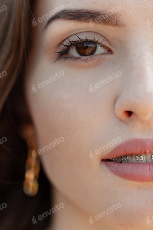Preview: Closeup portrait of beautiful Caucasian teenager woman with brown eyes
