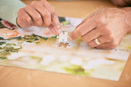 Preview: Puzzle on table, piece and hands of couple in home for bonding, fun activity and relax together. Re