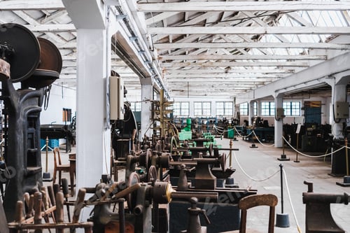 Preview: Interior of an old metalworking factory with metal lathes and presses.