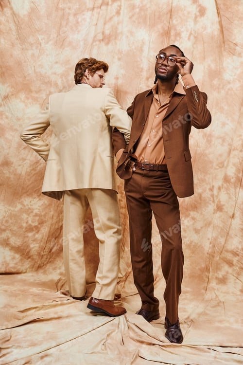 Preview: Dapper Duo by the Wall