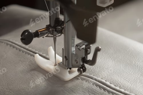 Preview: Modern sewing machine presser foot and item of clothing