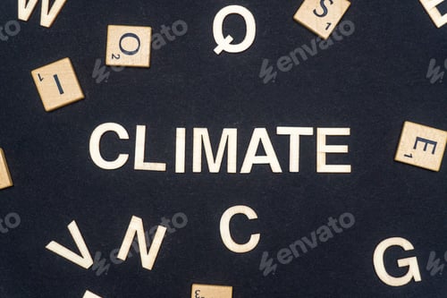 Preview: CLIMATE word written on dark paper background. CLIMATE text for your concepts