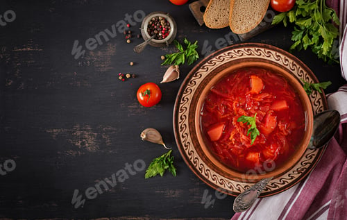 Preview: Traditional Ukrainian Russian borscht or red soup on the bowl. Top view