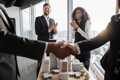 Preview: Selective focus on two business people applauding