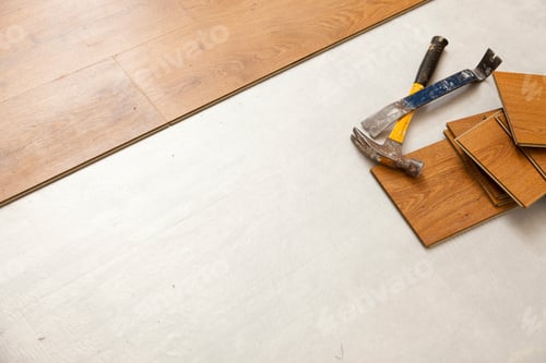 Preview: Hammer and Pry Bar with Laminate Flooring Abstract