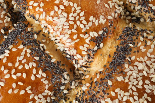 Preview: Sweet plaited challah as background, closeup. Fresh bread