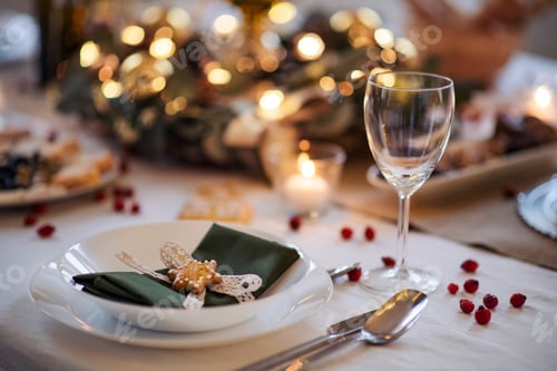 Preview: A close-up of table set for dinner meal at Christmas time.