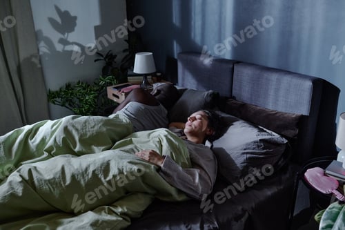 Preview: Couple in Bed at Night