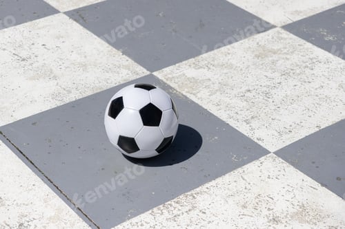 Preview: Soccer ball isolated on a gray and white checkered background