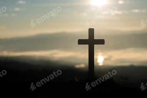 Preview: Silhouette of catholic cross and sunrise